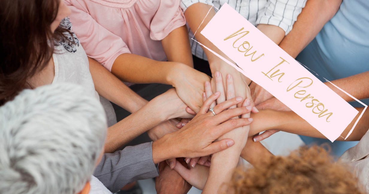 Header image of women in a circle touching hands in the middle with the text 